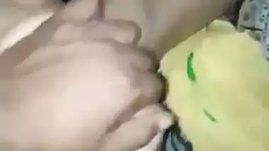 Guy squeezes a 19-year-old nude girl’s juicy boobs