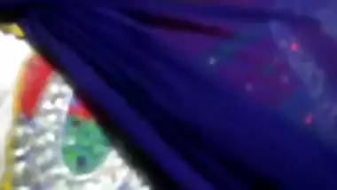 Teenage desi girl fondling her boobs through kameez