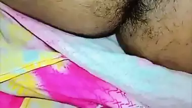Bhabhi in glasses goes naked and fingers cunt