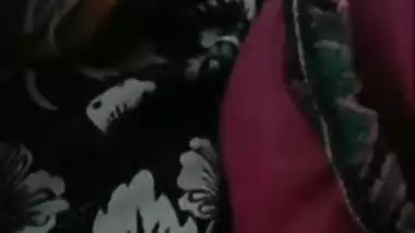 Aunty with perfect pussy lies in bed with legs wide open in XXX video