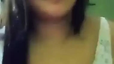 Cute girl opens bra to show sexy boobs to lover