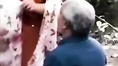 Uncle sucking aunty boobs while walking in park