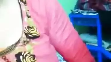 Female in a pink sari allows Indian man to touch her XXX boobs