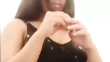 Chubby shy Indian girl showing round boobs to lover